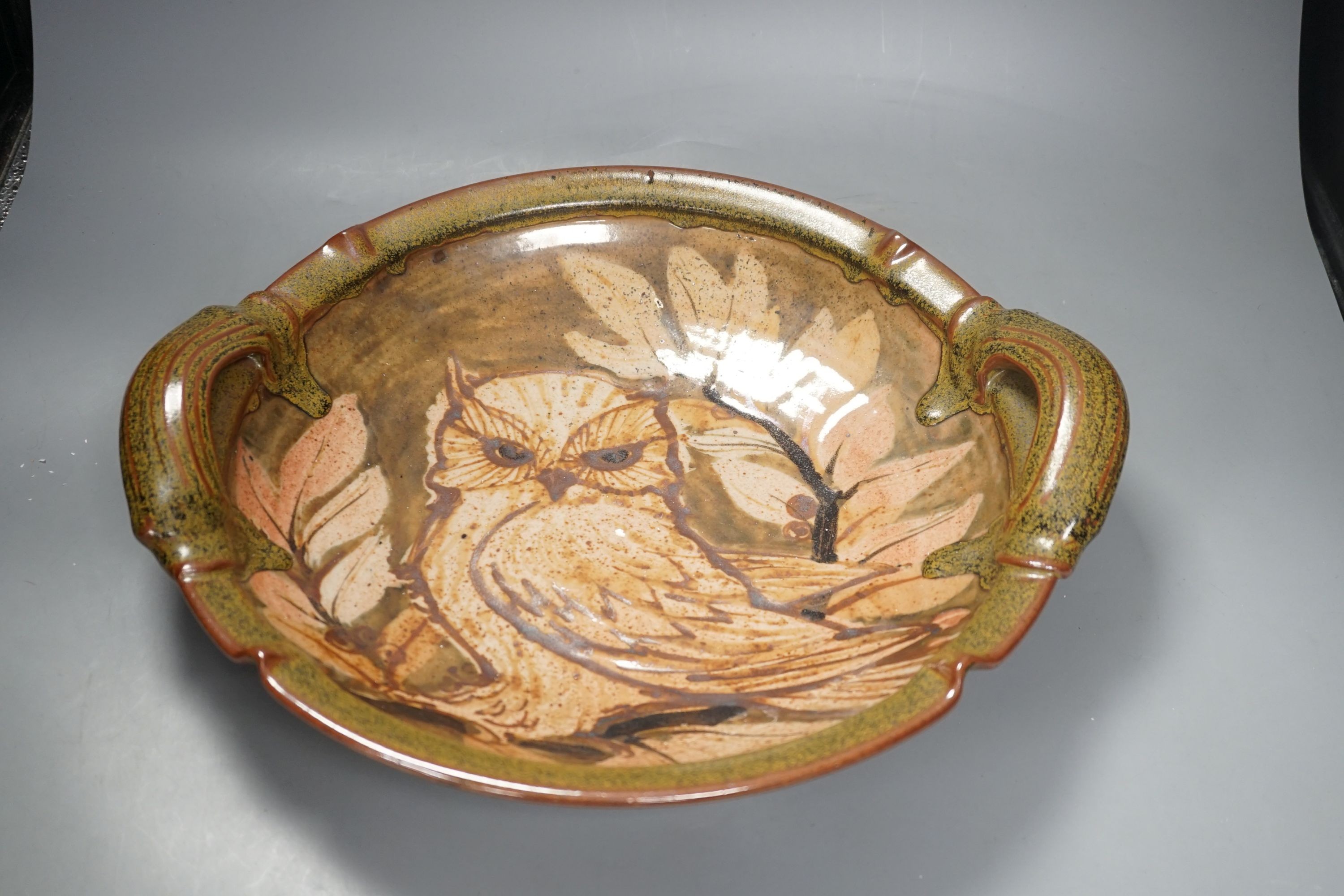 A Jane Hamlyn studio pottery dish, together with a David E. Eles owl dish and one other (3), David E Eles dish 42.5 cms diameter.